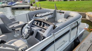 a boat sitting on top of a car