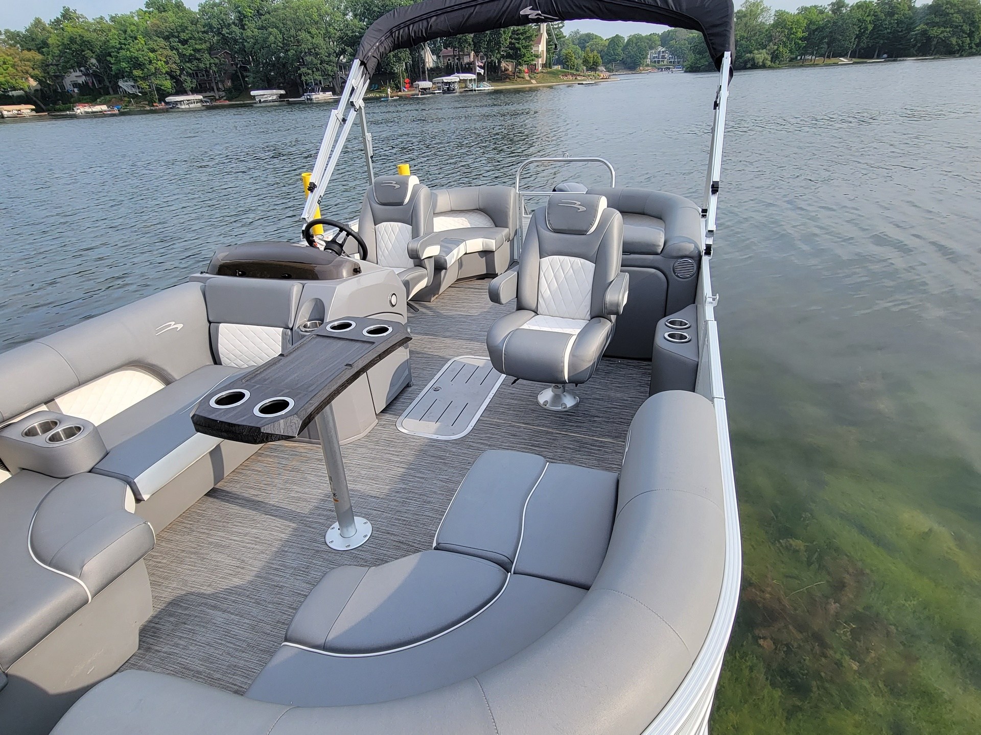 a boat sitting next to a body of water